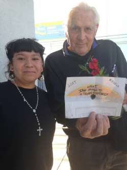 Holocaust Survivor Peter Daniels with a student at Locke High School, following Peter's visit to her classroom. 